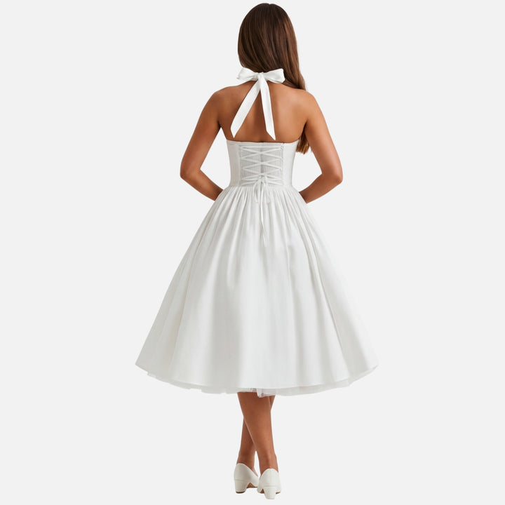 Abito midi con scollo halter e gonna svasata da donna