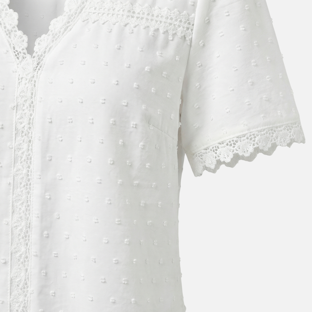Blusa con scollo a V, pizzo e pois in rilievo da donna