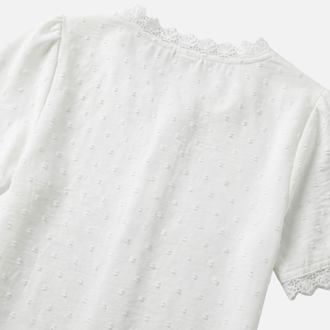 Blusa con scollo a V, pizzo e pois in rilievo da donna