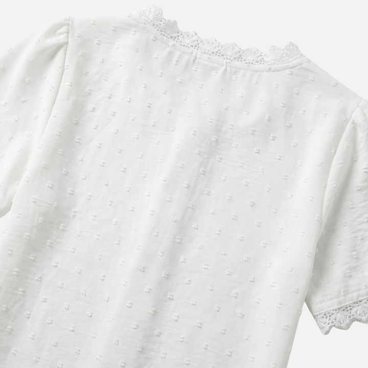 Blusa con scollo a V, pizzo e pois in rilievo da donna