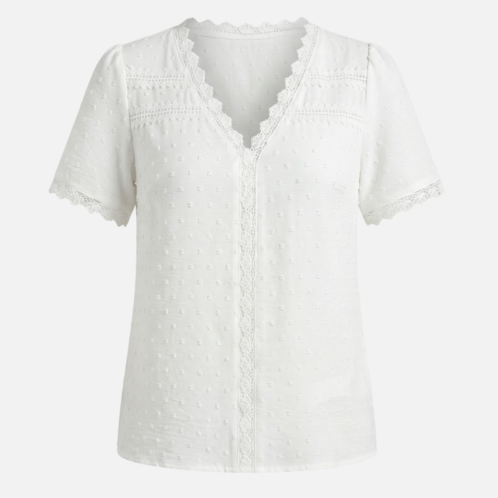 Blusa con scollo a V, pizzo e pois in rilievo da donna