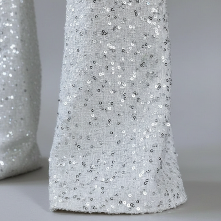 Tuta con paillettes, gambe larghe e spalline sottili da donna